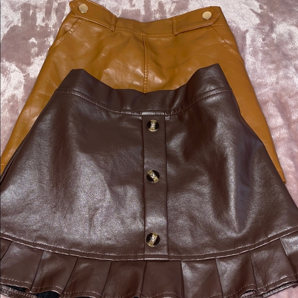 2 faux leather skirts